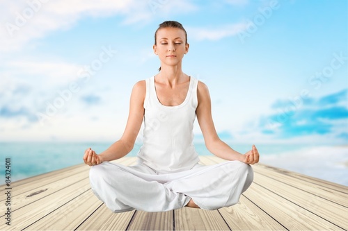 Yoga  Meditating  Women.