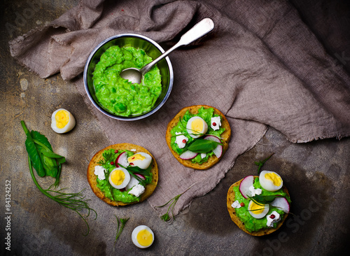 canape with green peas paste and eggs
