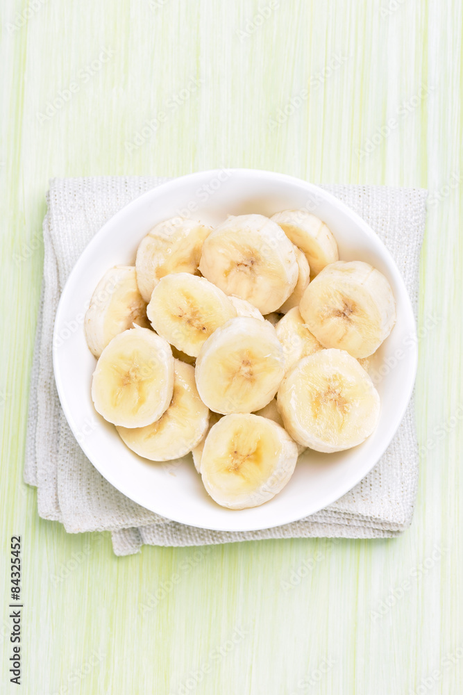 Sliced banana in bowl Sliced banana in bowl