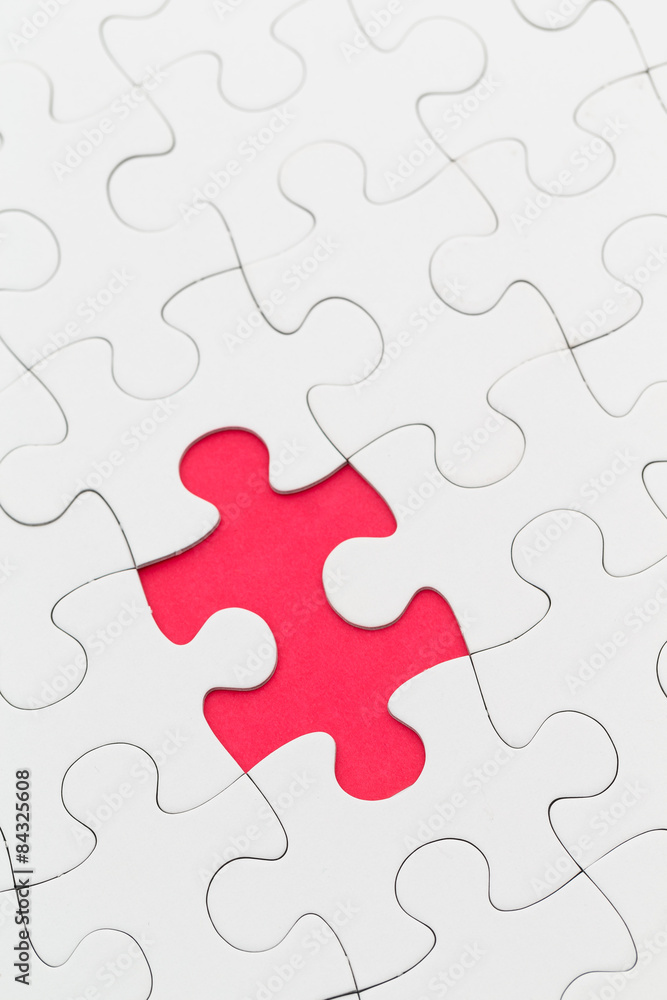 Plain white jigsaw puzzle with missing piece Plain white jigsaw puzzle with missing piece