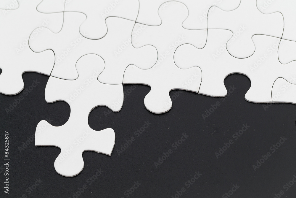 Puzzle on black background Puzzle on black background