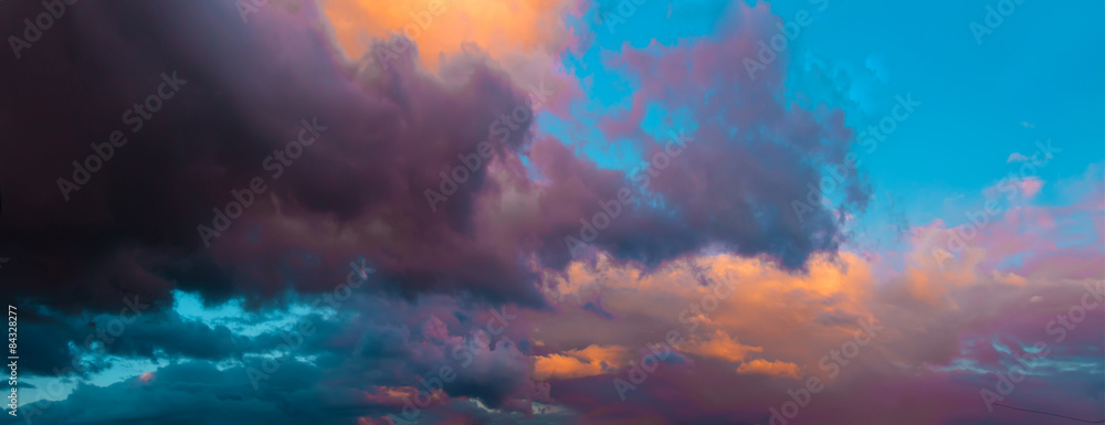 Dramatic evening cloudy sky at sunset. Panoramic view. - obrazy, fototapety, plakaty 