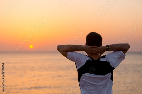 Young man enjoying the sea view