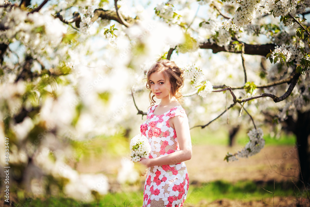 Beautiful young woman in spring garden Beautiful young woman in spring garden