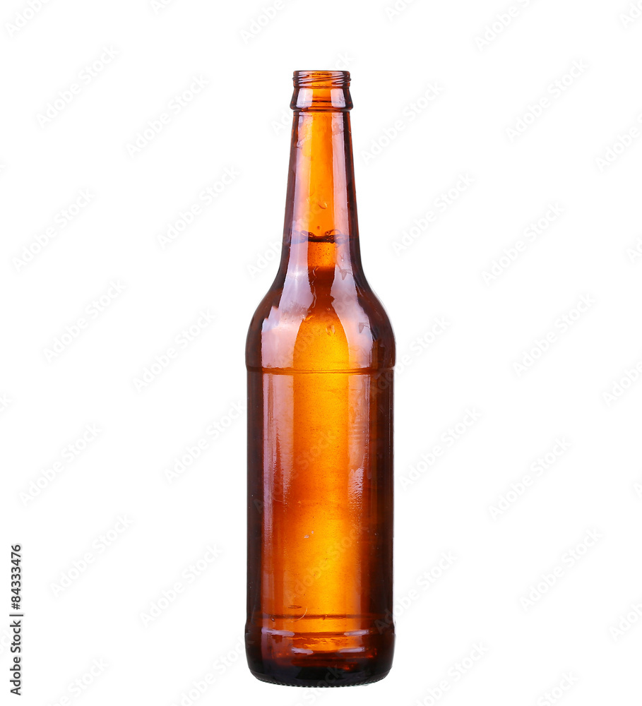 Bottle of beer with drops isolated on white background