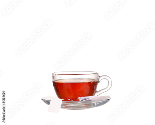 Tea in glass cup isolated on white background