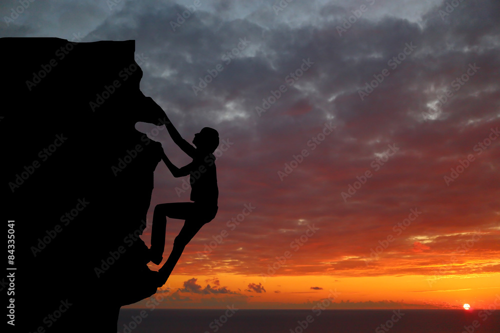 Teamwork couple hiking help each other trust assistance silhouette Teamwork couple hiking help each other trust assistance silhouette