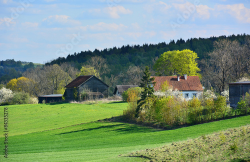 Spring landscape with old farm