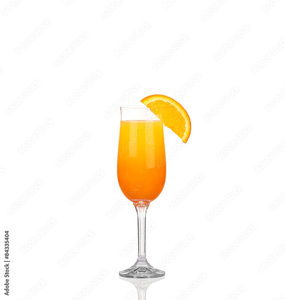 Glass of freshly pressed orange juice with sliced orange 