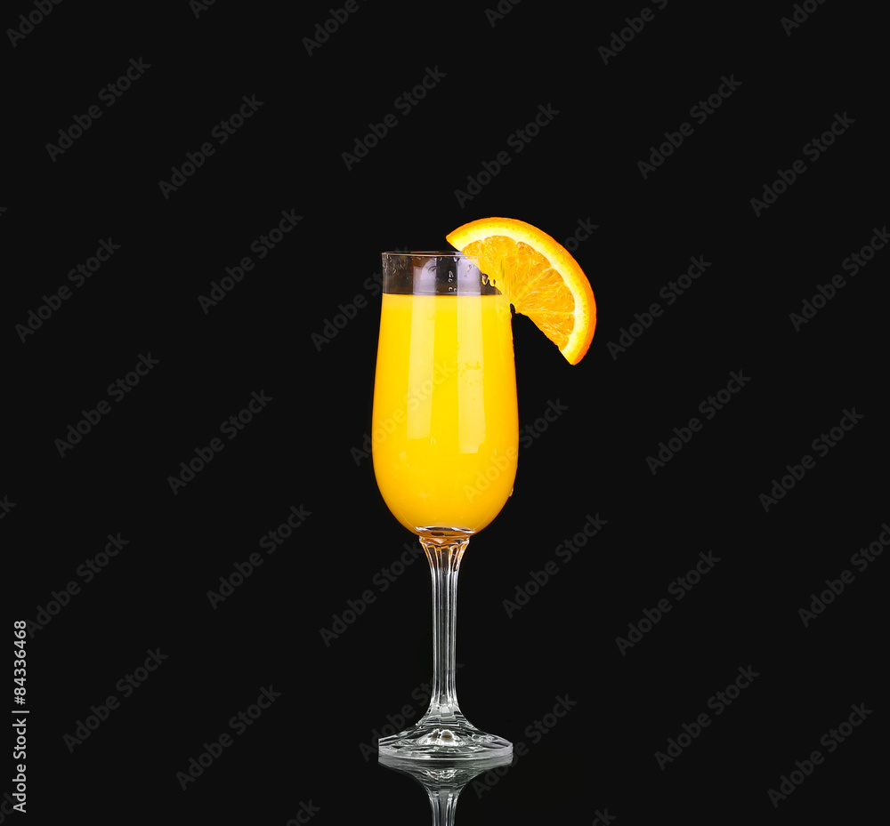 fresh organic orange juice and vodka in a tall glass 