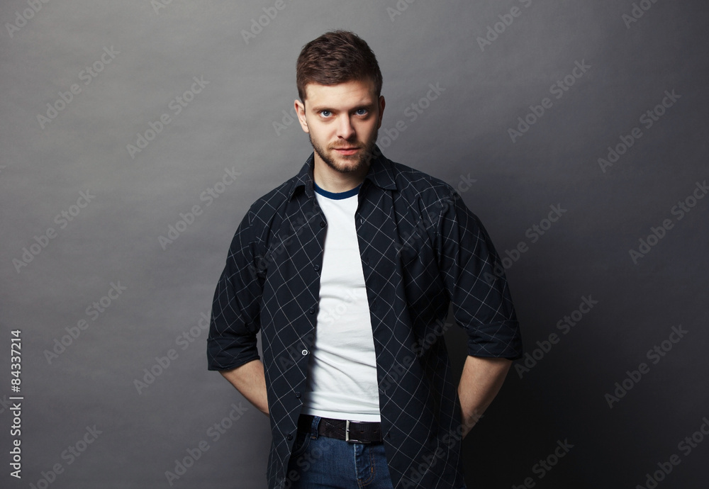 Portrait of young handsome man in t-shirt.