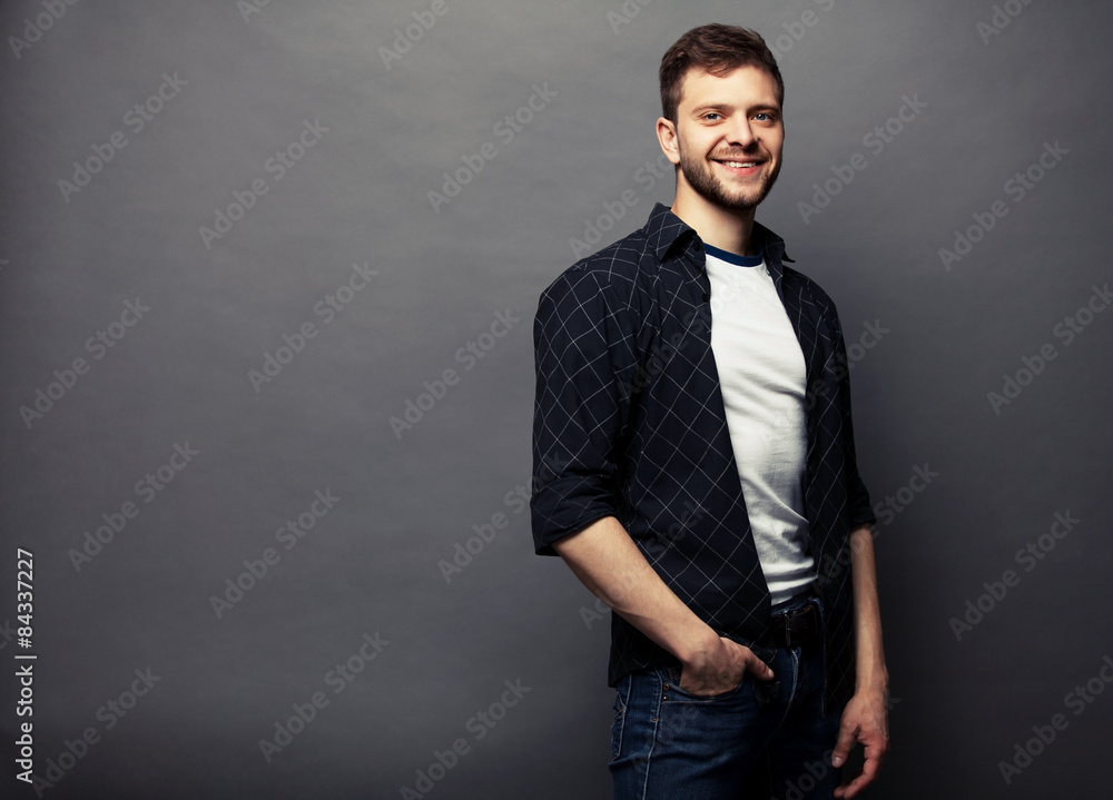 Portrait of young handsome man in t-shirt. Portrait of young handsome man in t-shirt.