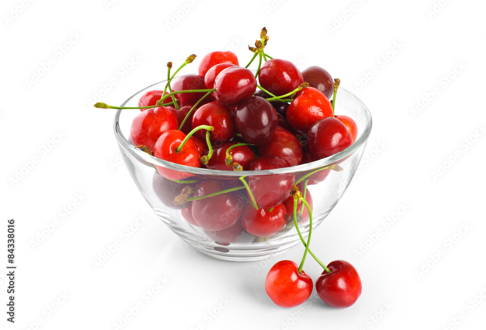 Cherries in a bowl isolated on white background. Cherries in a bowl isolated on white background.