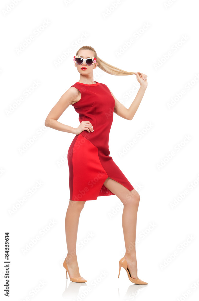 Pretty young woman in red dress isolated on white