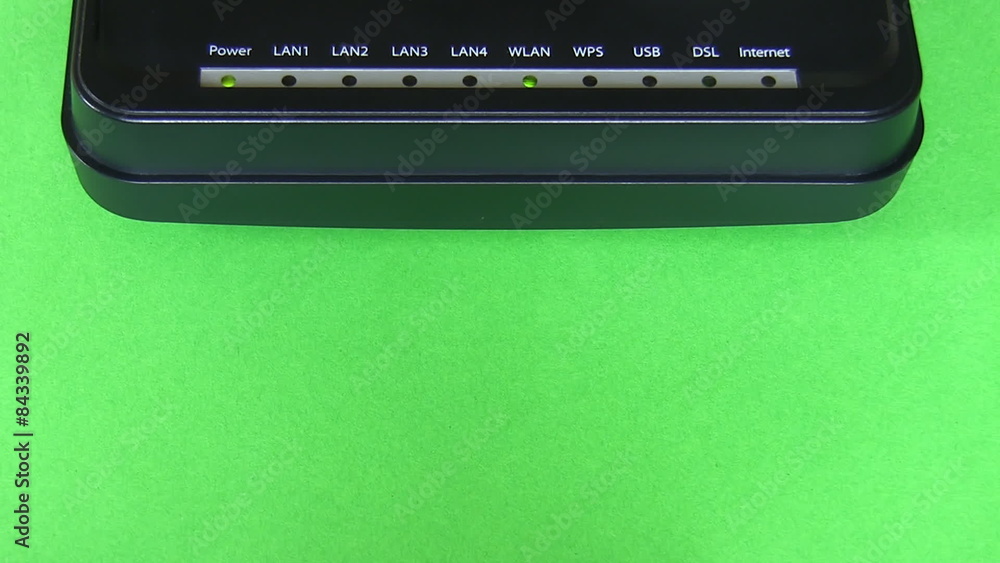 Computer internet modem isolated on green background connecting Computer internet modem isolated on green background connecting