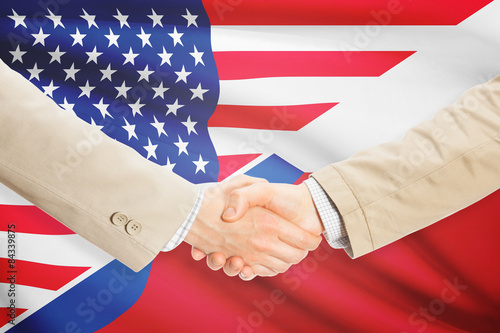 Businessmen handshake - United States and Czech Republic