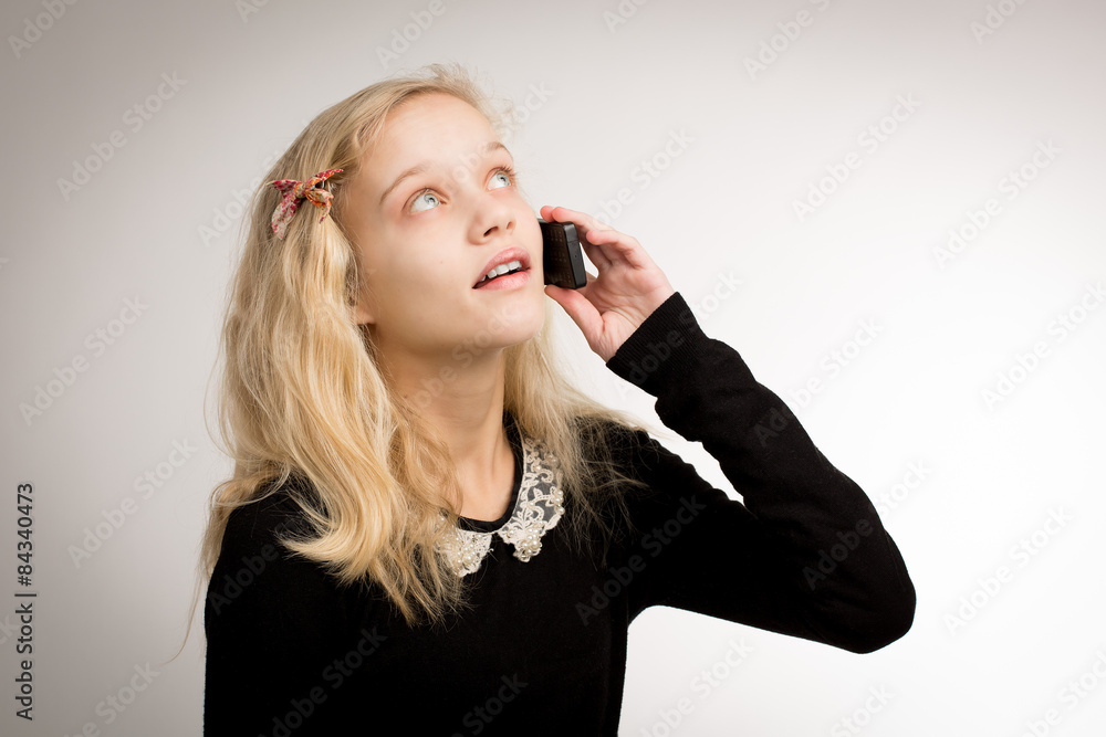 Teenage Girl Talking On Her Phone Looking Up Teenage Girl Talking On Her Phone Looking Up