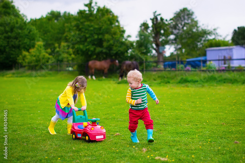 Kids playing on a farm