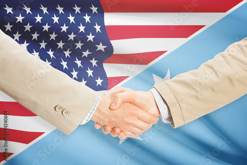 Businessmen handshake - United States and Micronesia