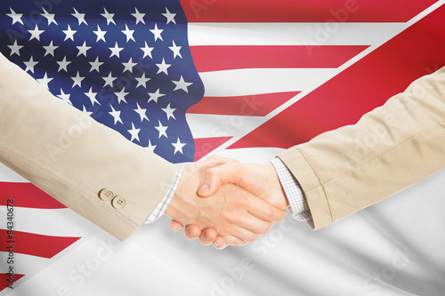 Businessmen handshake - United States and Monaco
