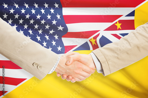 Businessmen handshake - United States and Niue