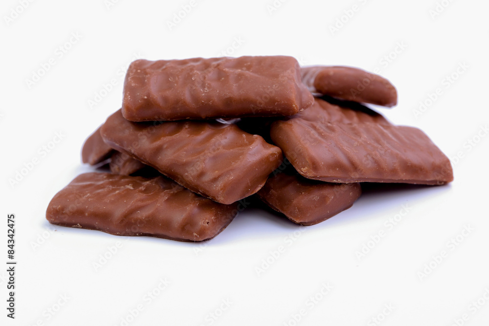 Chocolate candies on a white background. Chocolate candies on a white background.