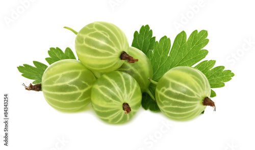 Pile of ripe green gooseberries with leaves (isolated)