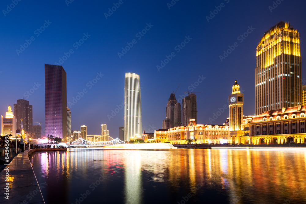 Naklejka premium modern buildings at riverbank