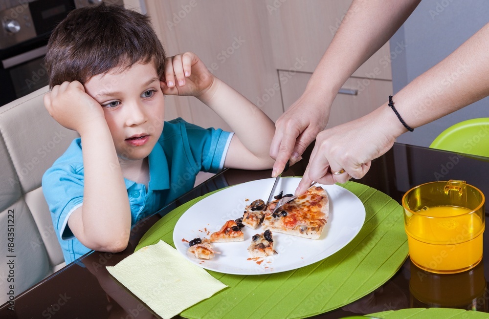 Mother who cut off her son's pizza