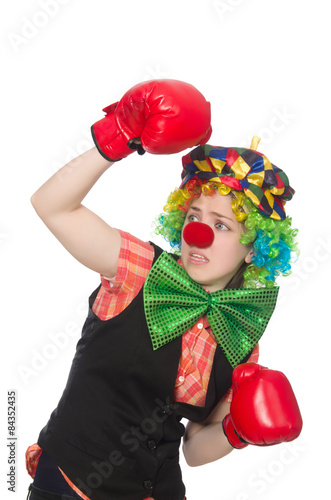 Female clown with box gloves  isolated on white © Elnur