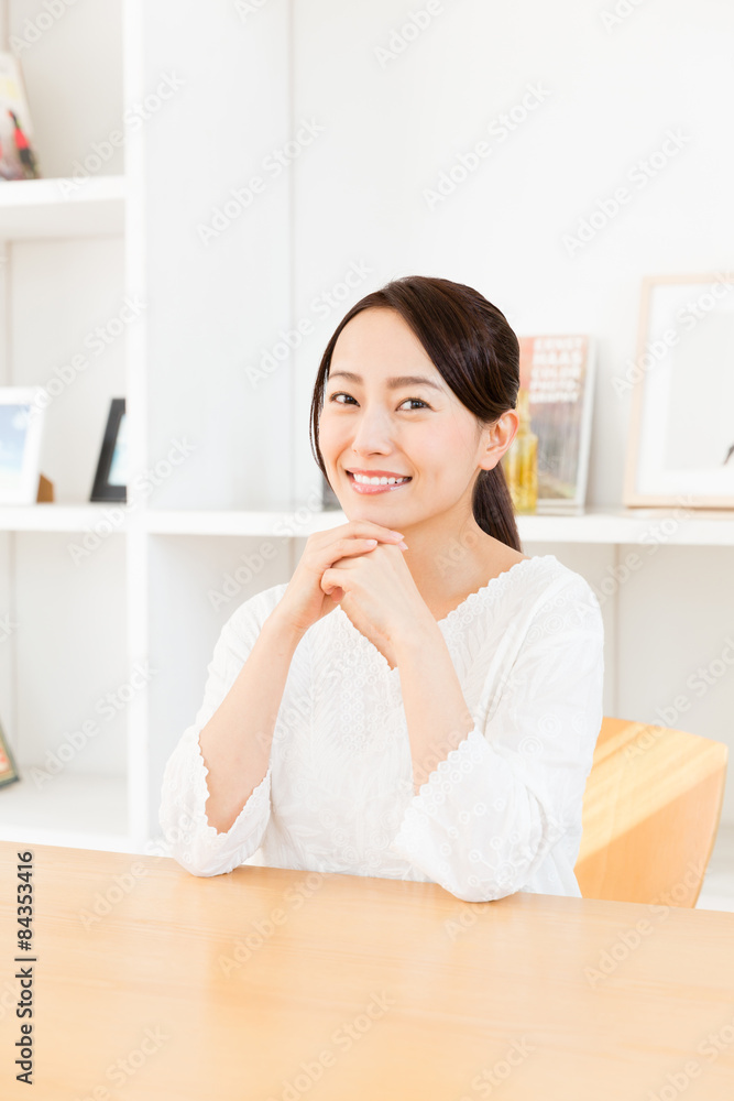 young asian woman relaxing in living room young asian woman relaxing in living room
