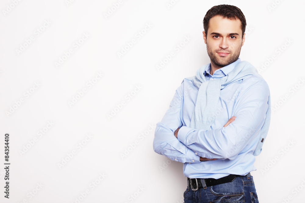 happy young man in blue shirt. happy young man in blue shirt.