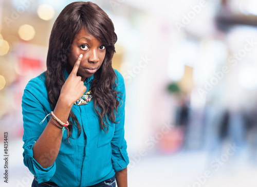 black woman pointing eye