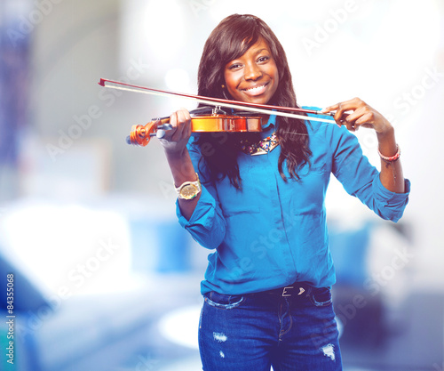 cool black woman playing violin