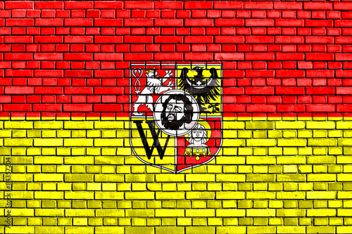 flag of Wroclaw painted on brick wall