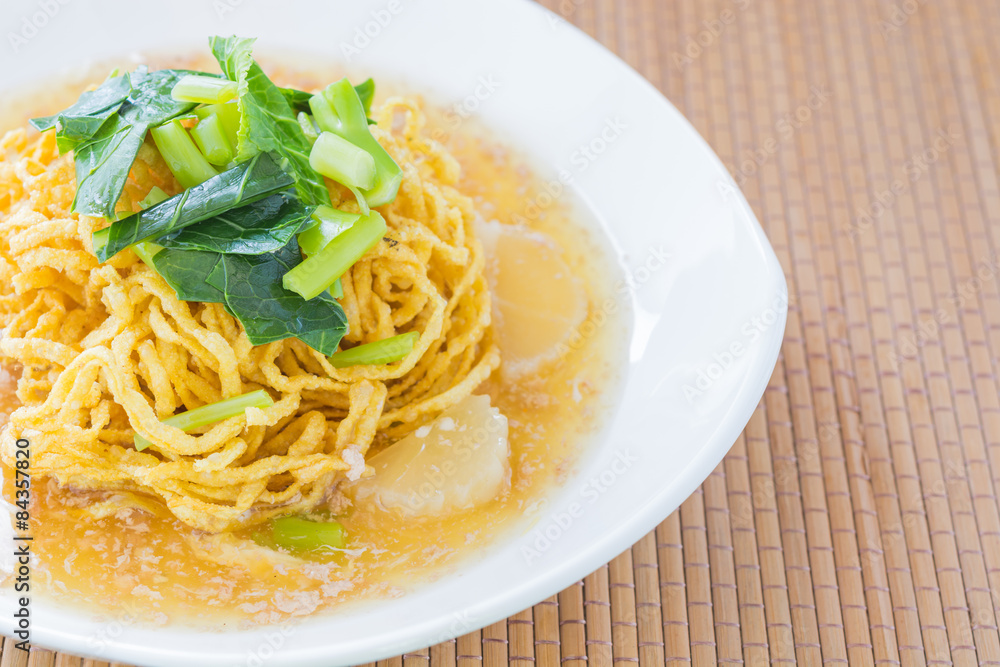 Pan fried noodles with pork.