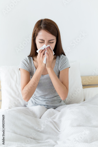 Asian woman feeling unwell