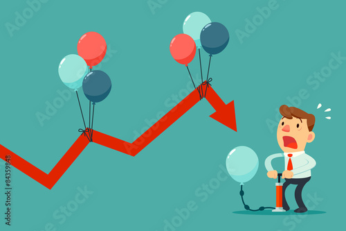 businessman pumping balloon to help falling graph