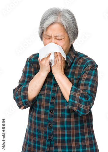 Elderly woman sneeze
