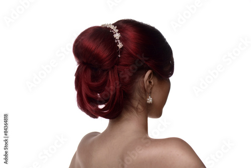 Back view of a young woman with elegant bridal hairstyle