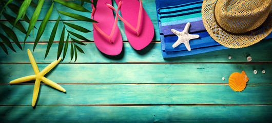 Beach accessories on wooden - summer background
