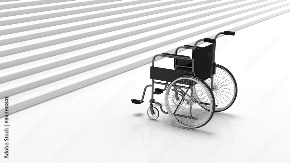 Black disability wheelchair near white stairs