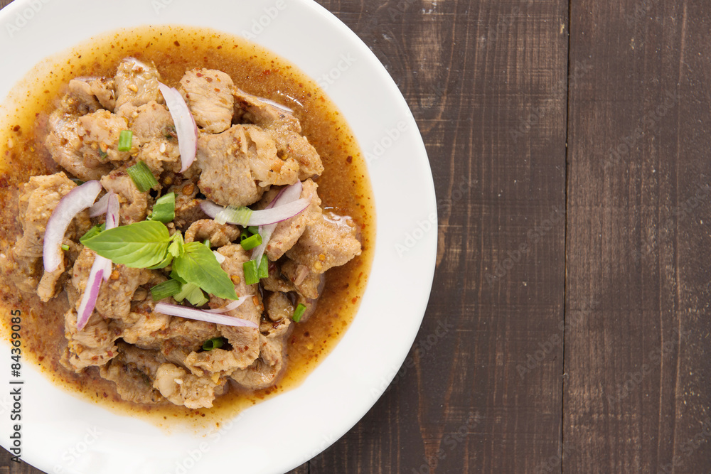 Thai food name is Grilled pork with spicy salad, Thai food. Thai food name is Grilled pork with spicy salad, Thai food.