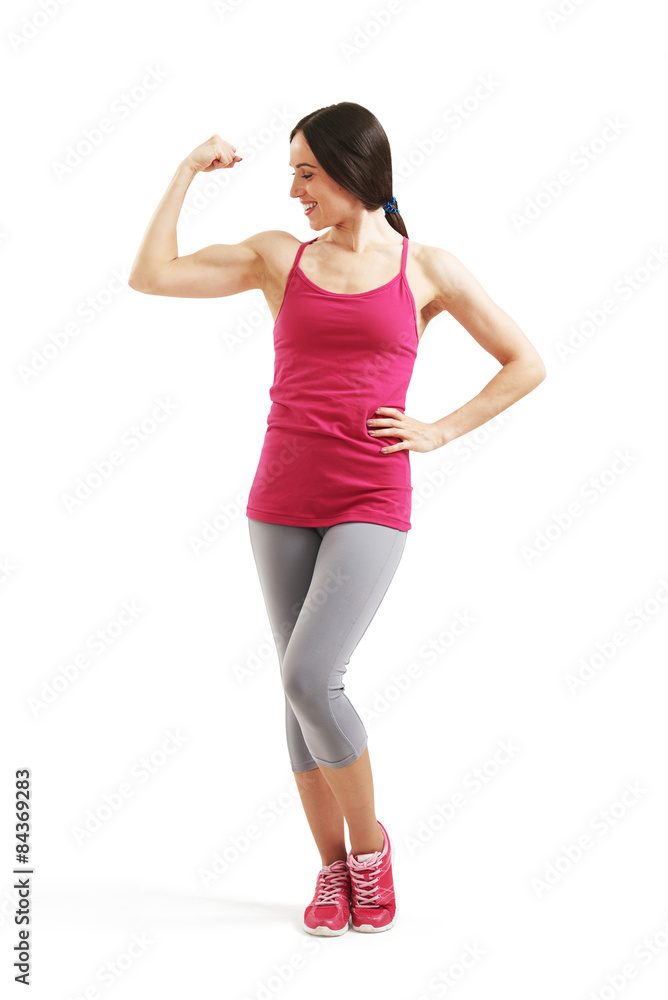 smiley woman showing her biceps smiley woman showing her biceps