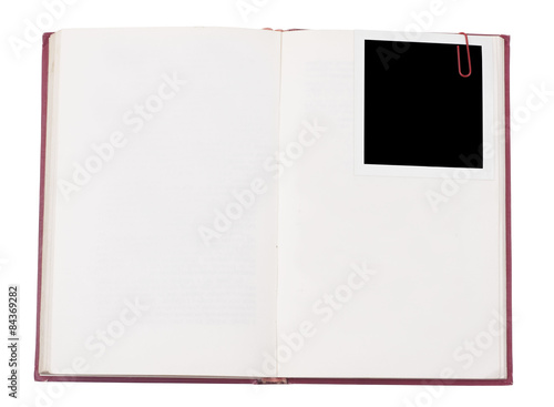 Red hardcover book and photo frame