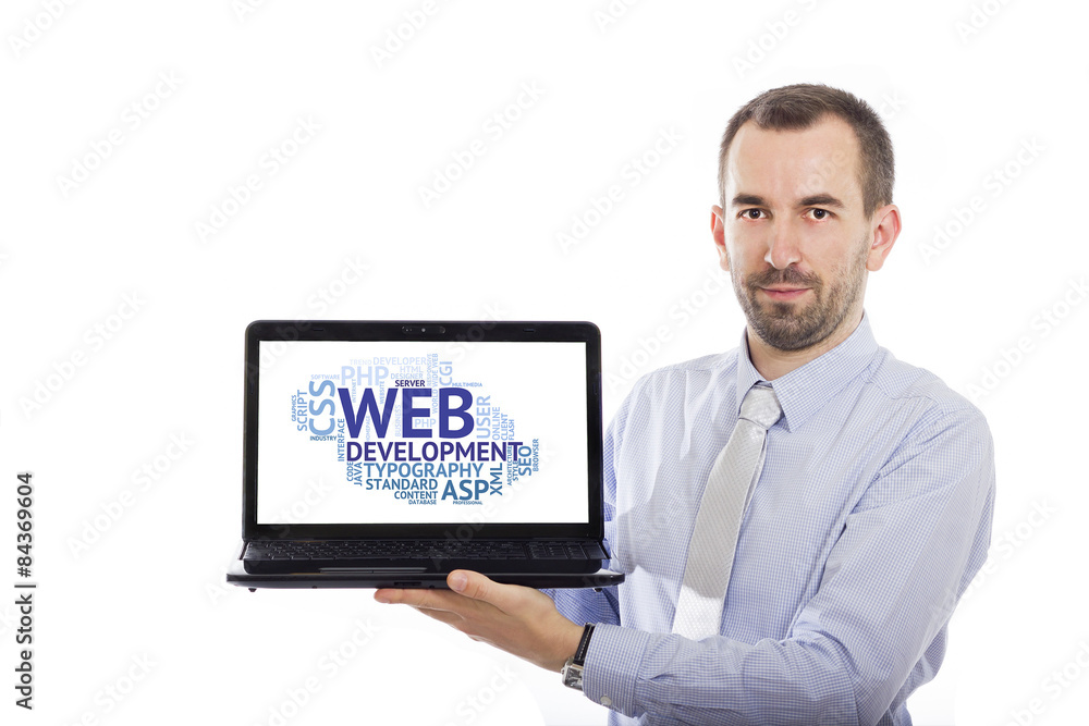 Businessman holding Laptop with Web Development concept Businessman holding Laptop with Web Development concept