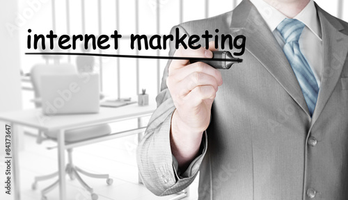 business man writing internet marketing