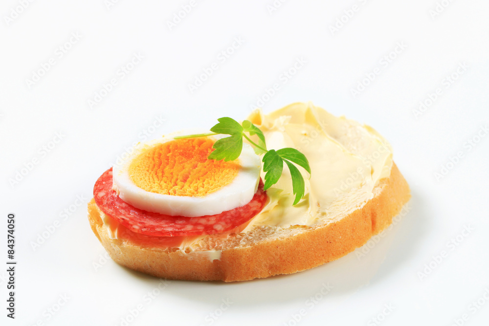 Bread with salami and egg