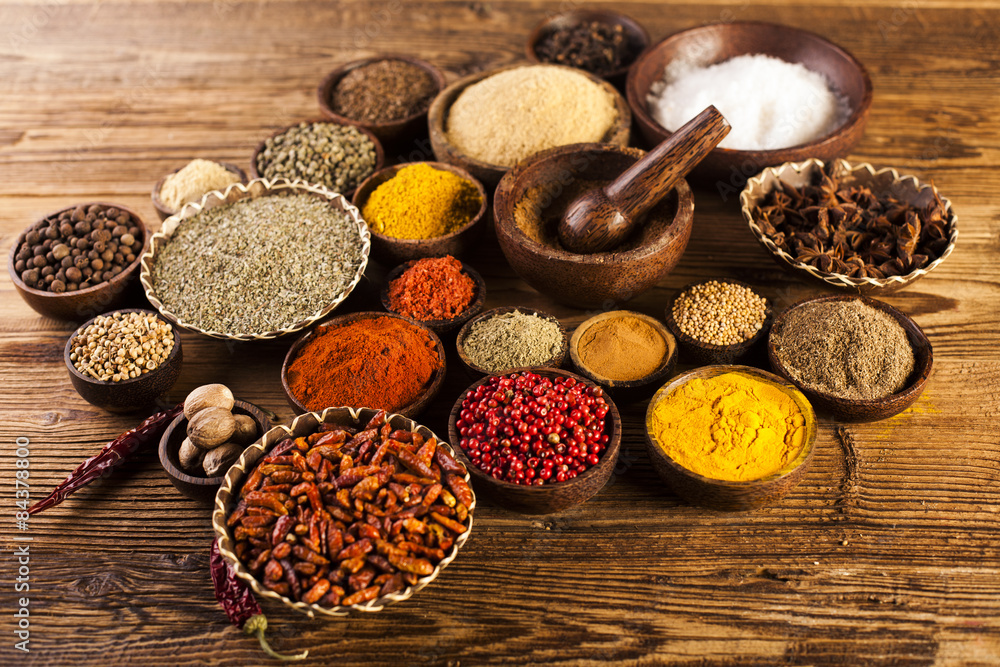 Wooden table of colorful spices Wooden table of colorful spices