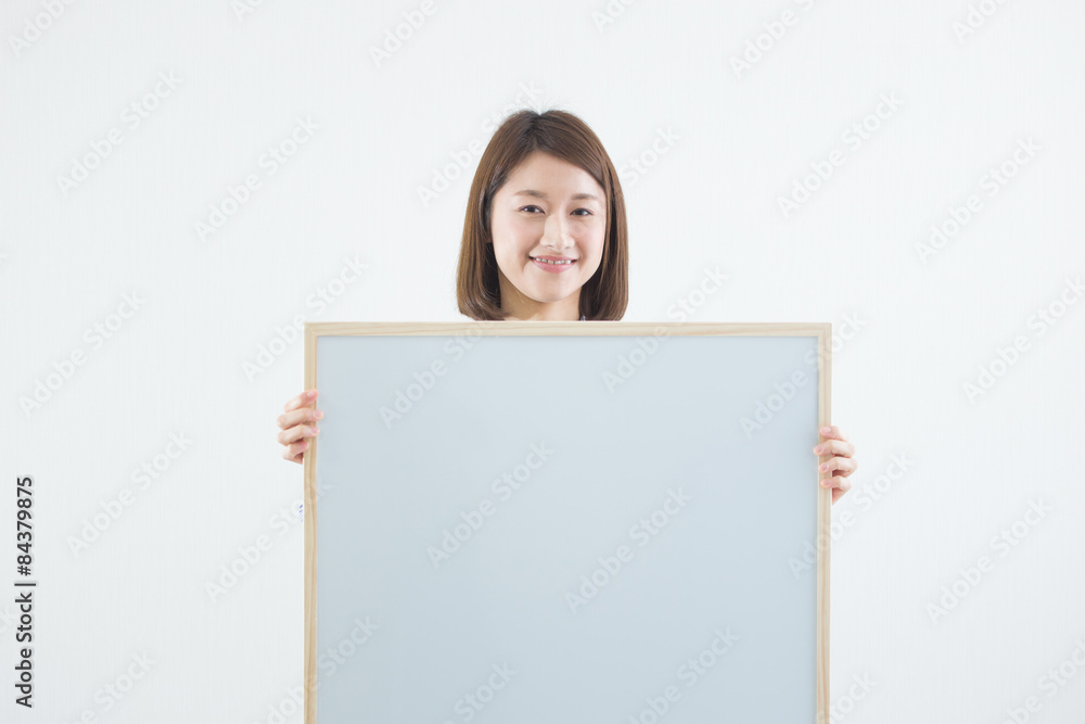 ボードを持つ女性 ボードを持つ女性